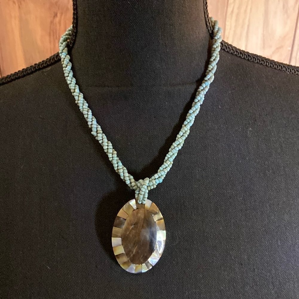 twisted blue bead multi-strand necklace with beautiful pendant